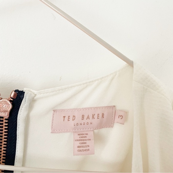 NWOT Ted Baker Cold Shoulder Jumpsuit,
Navy/White Size US 8 - Picture 12 of 16